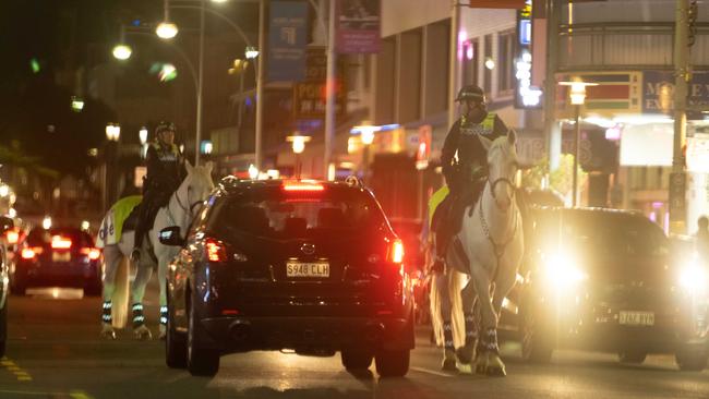 Police on Hindley Street on a Friday night in Adelaide. picture: Morgan Sette