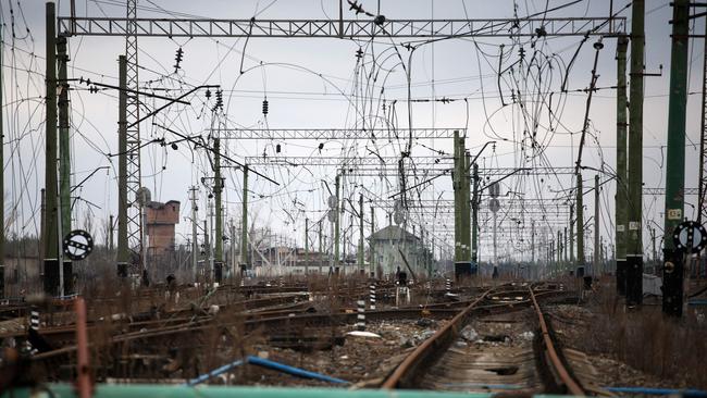 War damaged railroad tracks and power lines in the Sosnove village, Donetsk region.