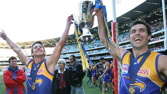 Banfield celebrates the 2006 Premiership with Ben Cousins.