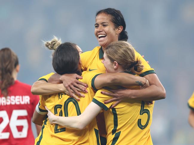 SYDNEY, AUSTRALIA - SEPTEMBER 06: Mary Fowler of the Matildas celebrates scoring a goal with teammates during the International Friendly Match between the Australia Matildas and Canada at Allianz Stadium on September 06, 2022 in Sydney, Australia. (Photo by Mark Metcalfe/Getty Images)