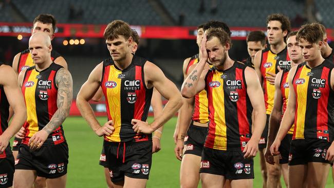 MELBOURNE, AUSTRALIA - MAY 18: The Saints walk off after they were defeated by the Dockers during the round 10 AFL match between Euro-Yroke (the St Kilda Saints) and Walyalup (the Fremantle Dockers) at Marvel Stadium, on May 18, 2024, in Melbourne, Australia. (Photo by Robert Cianflone/Getty Images)