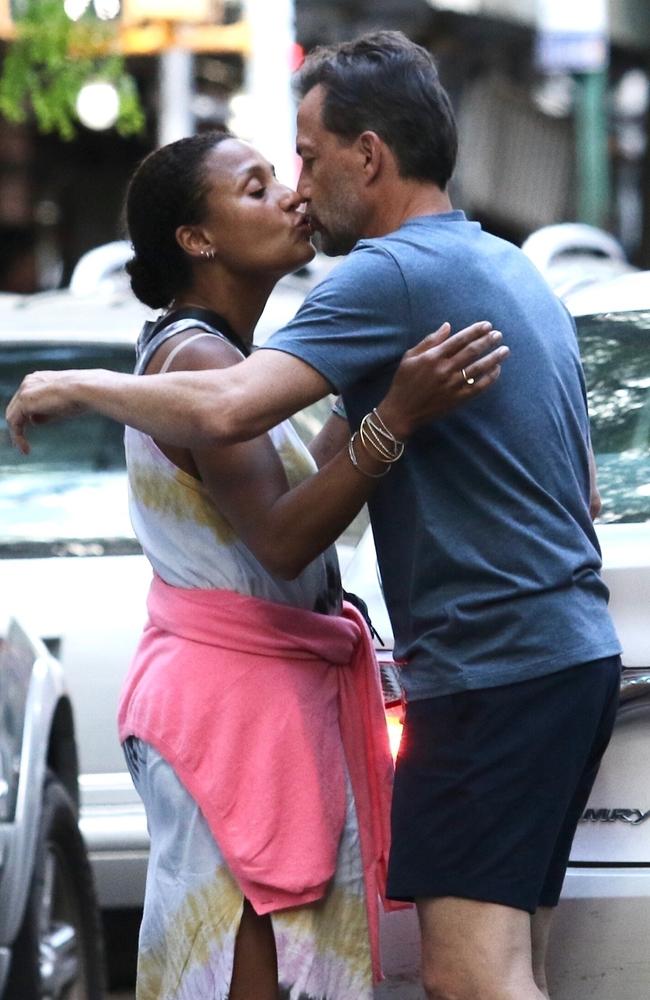 Andrew Shue and Marilee Fiebig share a passionate kiss in Manhattan on Monday. Picture: BrosNYC / BACKGRID