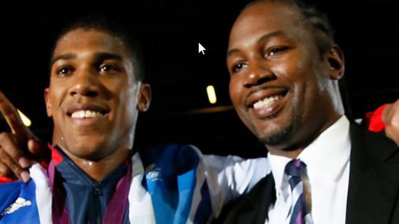 Anthony Joshua and Lennox Lewis in better times at the 2010 London Olympics.