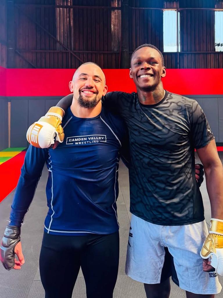 'Rivals one day, friends the next': Rob Whittaker training with Israel Adesanya. Picture: Instagram