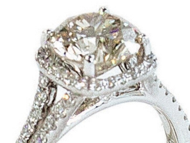 A white gold diamond ring, similar to this, was also taken.