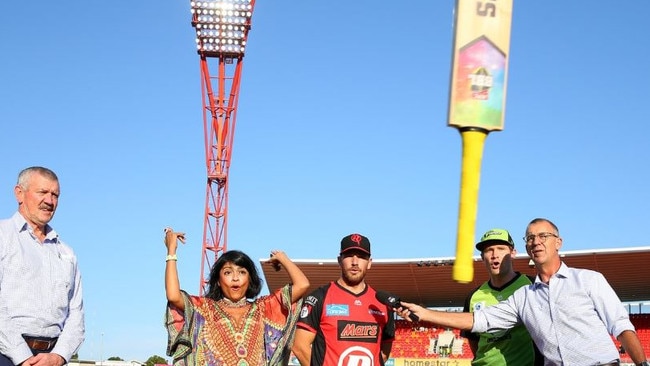 Aaron Finch and Shane Watson look horrified by this botched bat toss.