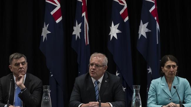 Professor Brendon Murphy, Prime Minister Scott Morrison and NSW Premier Gladys Berejiklian. Picture: Brook Mitchell/Getty