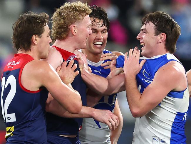Things get heated between Clayton Oliver and George Wardlaw on Saturday night. Picture: Quinn Rooney/Getty Images
