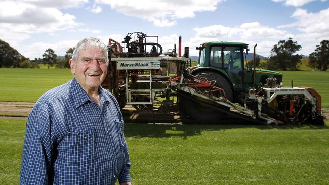 Bill Casimaty with one of the machines use to harvest the turf on the StrathAyr farm.