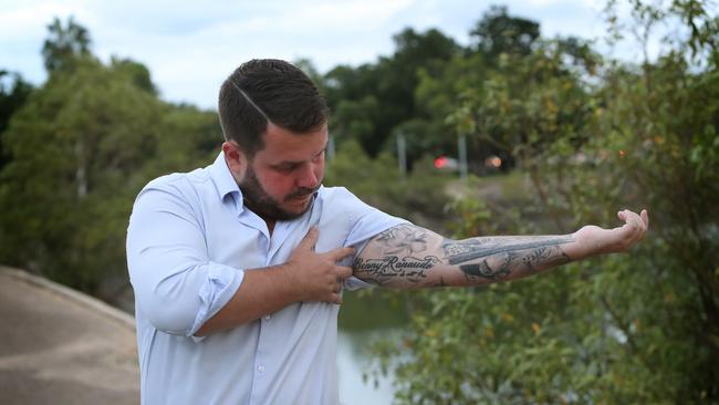 Phil Thompson shows a  tattoo of the name of his mate Benny Ranaudo who was killed in action in Afghanistan in 2009. Picture: Kym Smith