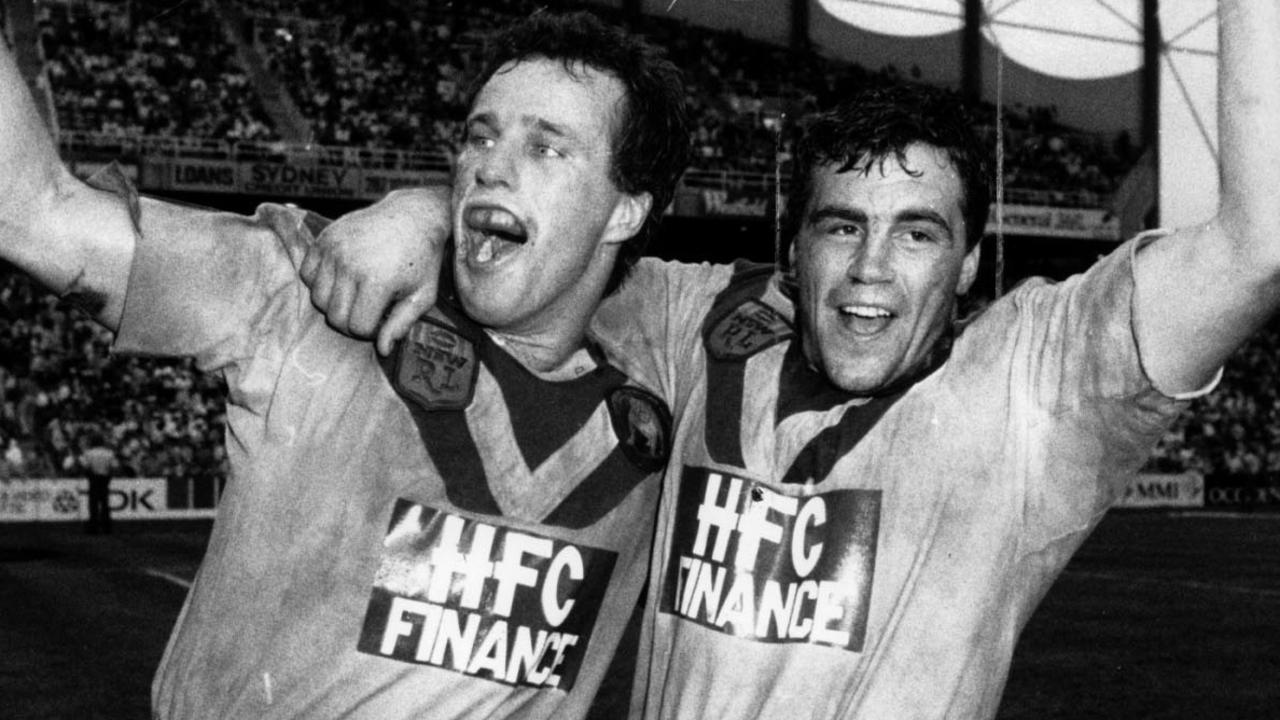 Paul Langmack, left, celebrates with David Gillespie after the Bulldogs’ grand final win in 1988.