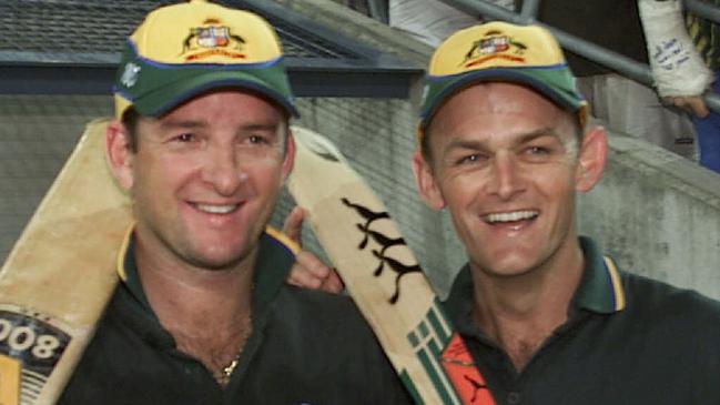 JANUARY 14, 2001 : Batsmen Mark Waugh (L) & Adam Gilchrist following their double century opening stand during Australia v West Indies one-day International at Gabba ground in Brisbane, 14/01/01. David Kapernick.Cricket