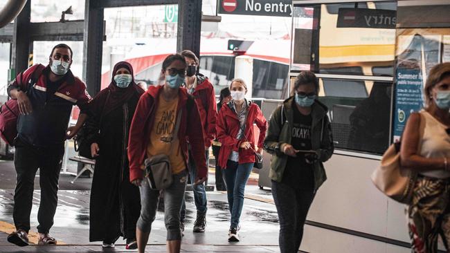 Passengers wearing face masks at Circular Quay ferry wharf today. Picture: NCA NewsWire/Flavio Brancaleone