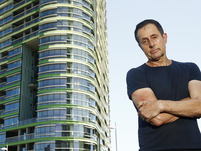 Opal tower tennant Anthony Leece outside the stricken Opal Tower at Sydney Olympic park. Picture: John Appleyard