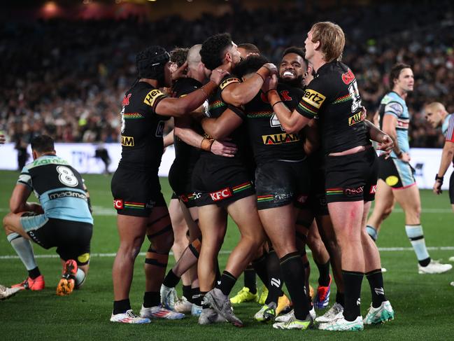 SYDNEY, AUSTRALIA - SEPTEMBER 28: Paul Alamoti of the Panthers celebrates scoring a try with teammates during the NRL Preliminary Final match between the Penrith Panthers and the Cronulla Sharks at Accor Stadium on September 28, 2024 in Sydney, Australia. (Photo by Jason McCawley/Getty Images)