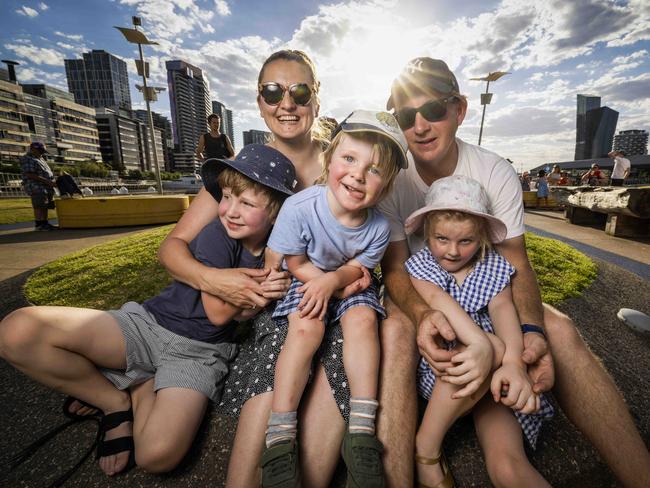 Matt and Eliza Morris with children Harvey, 7, Felix, 3, and Pia, 5 enjoyed the performances in Docklands. Picture: Nicole Cleary