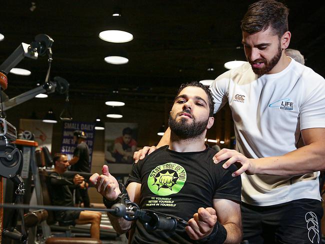 Moustafa Ardati with trainer George Boutros from C-Life at Canterbury Leagues Club. Picture: Carmela Roche