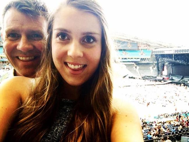 Mike Baird with his daughter at the Taylor Swift show in Sydney. Photo: Facebook