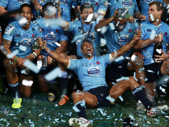 The Waratahs celebrate winning the Super Rugby title in 2014.