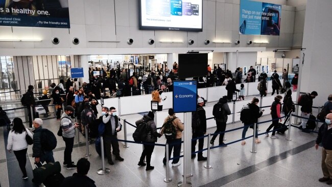 Travellers arrive for flights at Newark Liberty International Airport on November 30, 2021 in Newark, New Jersey. Picture: Getty Images