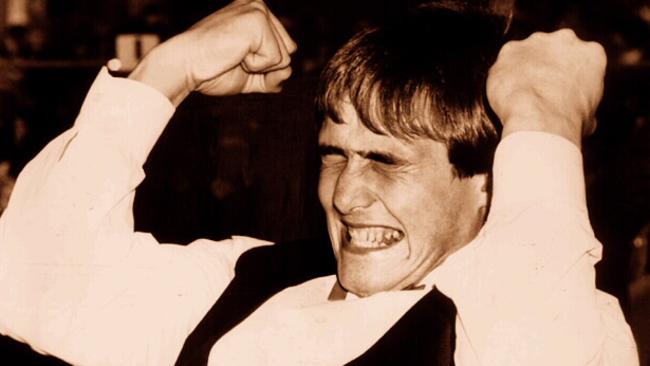 Tony Lockett celebrates winning the 1987 Brownlow Medal.