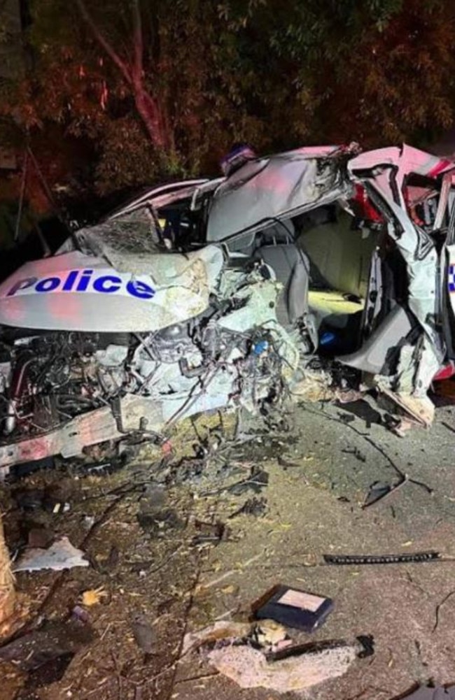 Damage to a police car taken by a man who was confronted by police after reports he was armed with a knife.