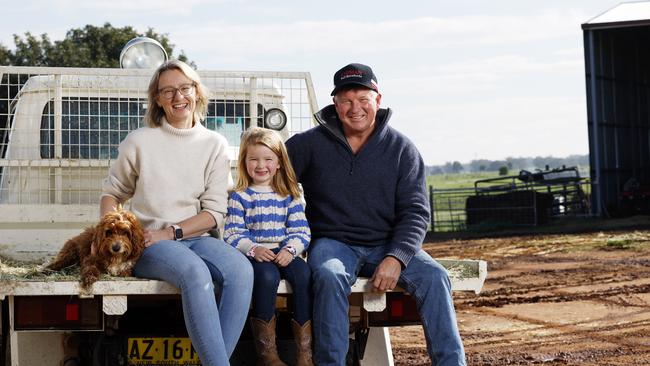 DAILY TELEGRAPH AUGUST 15, 2024. EMBARGOED FOR THE DAILY TELEGRAPH BUSH SUMMIT, PLEASE CONTACT PIC EDITOR NICOLA AMOROS BEFORE PUBLISHINGHereford farmer Nelson Carlow on his Terramungamine farm with wife Susan and their daughter Ellie, 5, and dog Molly Mop. Picture: Jonathan Ng