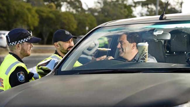 Constable Adam Grimley and Constable Brian Gretch test Zarraffas Coffee Newtown franchisee Damian Doyle. Thursday, 27th Jun, 2019.