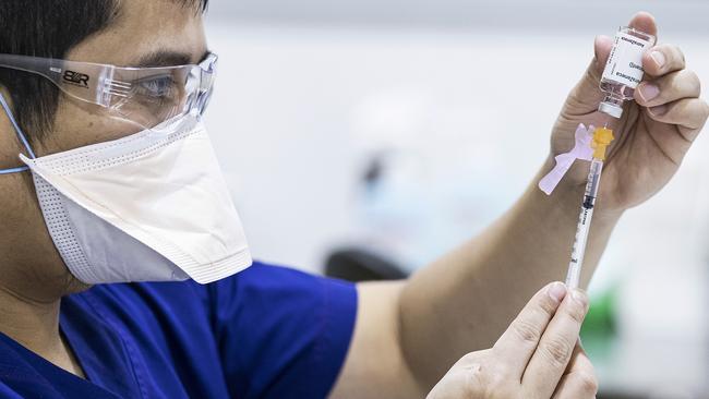 A health worker prepares a dose of the AstraZeneca vaccine. Picture: Getty Images