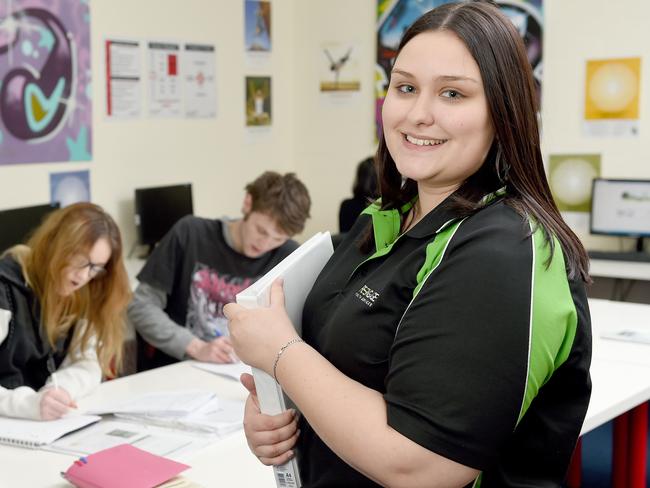 22/9/16 - 5000 jobs in 50 days campaign PIC is of Hayley Clavell in the workplace at Re-Engage Youth Services, a not-for-profit organisation which helps get young people into work, so know how employers can keep them. It also was named on the Great Places to Work list, sitting among companies such as Swisse and Estee Lauder, so practices what it preaches. Hayley is a case manager and says it's a supportive workplace. Pictured with Britney Eastwood, 17 and Jaymes Ryan, 19. Photo Naomi Jellicoe