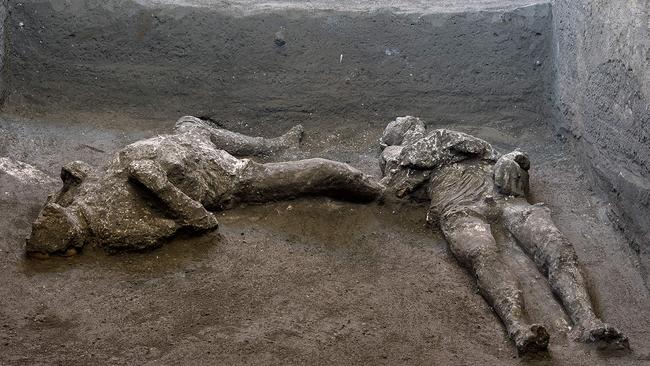 The cast bodies of a 40-year-old master and his young slave. Picture: Handout / POMPEII ARCHAEOLOGICAL PARK / AFP
