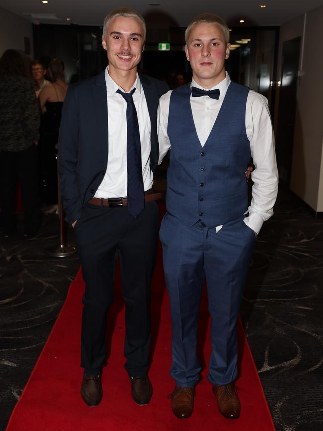 MELBOURNE, AUSTRALIA – JUNE 14 2024 Steven Kippen and William Cuthbertson attend the Lowanna College Senior Formal 2024 at the Moe Racing Club Picture: Brendan Beckett