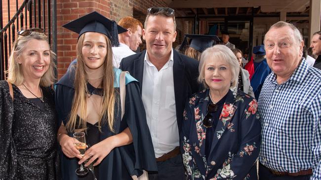 Di, Ebony and Jasen Crighton with Rob and Maria Vana celebrate graduation. Picture: Brad Fleet