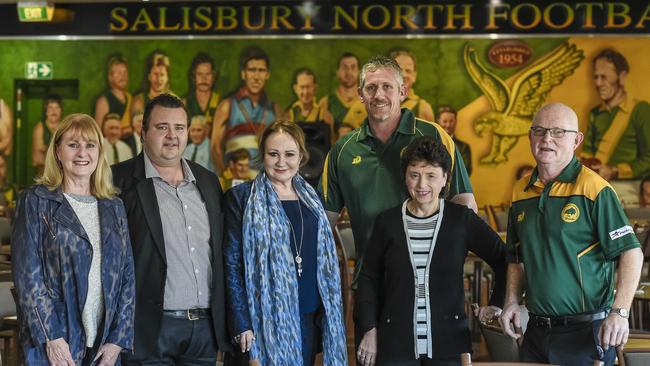 Salisbury Mayor Gillian Aldridge (centre) with councillors and Salisbury North members. The council has thrown its support behind the footy club. Picture: AAP/Roy Vandervegt