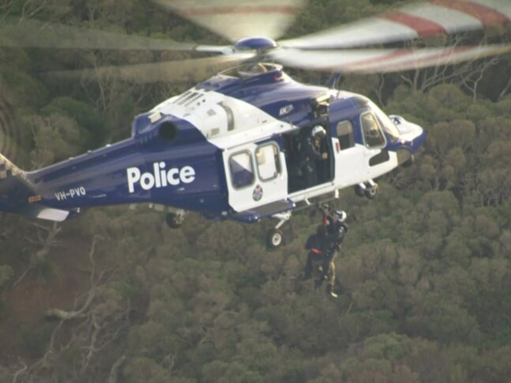An officer descended from the police helicopter to help the man. Picture: ABC News