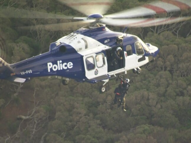 An officer descended from the police helicopter to help the man. Picture: ABC News