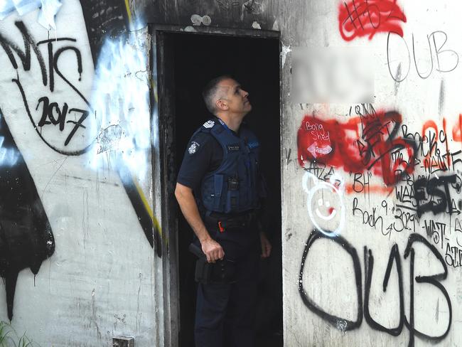 Police inspect the damage at the Ecoville Community Centre in Tarniet. Picture: Nicole Garmston