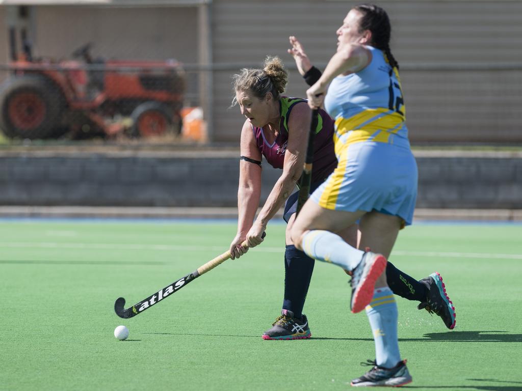 Karen Nixon (left) of Redlands 1 against Tanya Lesina of Cairns 1.