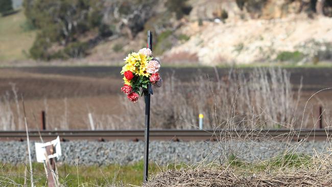 Tribute flowers along Trea Tree Road as there have been a number of accidents. Picture: Zak Simmonds