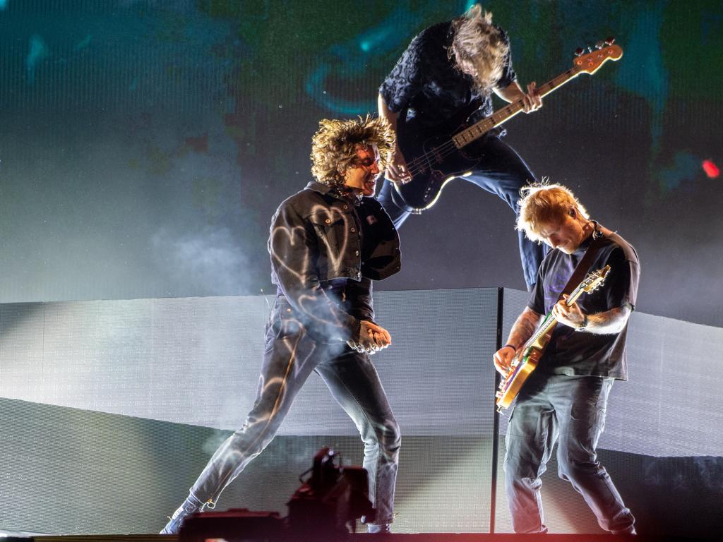 Oli Sykes of Bring Me the Horizon and Ed Sheeran perform on the main stage at Reading Festival in Reading, England. (Photo by Joseph Okpako/WireImage)