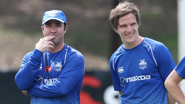 Jared Polec, right, with new coach Brad Scott.