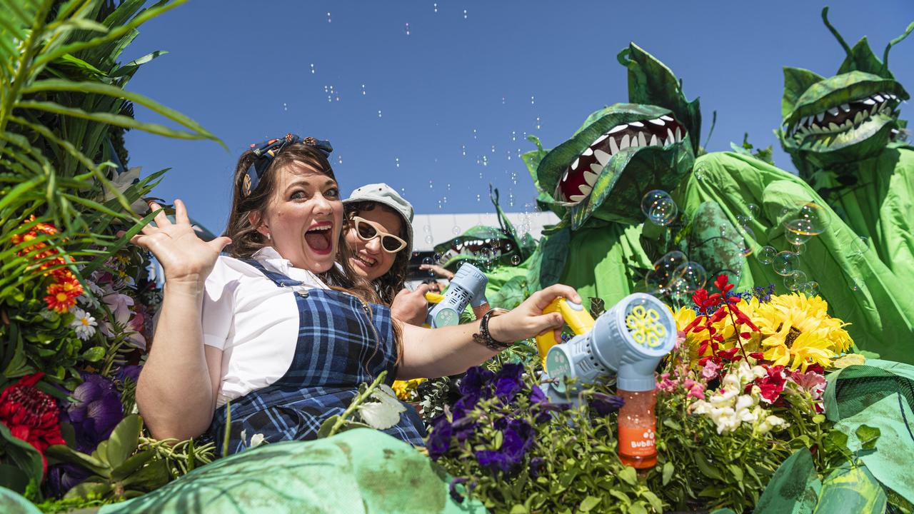 Tara Gillespie (left) and Lydia Cunnington on the Shoebox Theatre Company float Little House of Horrors in the Grand Central Floral Parade of the Carnival of Flowers, Saturday, September 21, 2024. Picture: Kevin Farmer