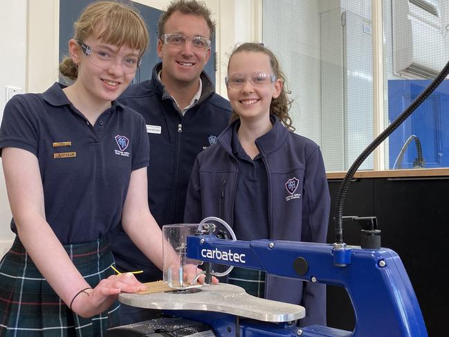 Mitcham Girls High School. STEM teacher Simon Brooks with Year 7 studentsMadeleine Schiller (left) and Tea Conry. October 2020. Picture: ChrisRussell