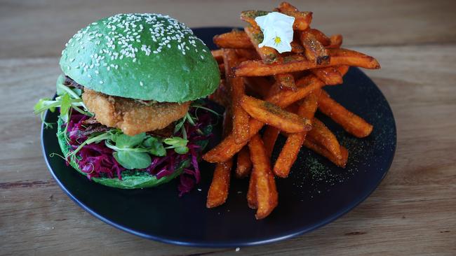 Matcha Mylkbar’s “chicken" burger with the green matcha bun. Picture: Rebecca Michael