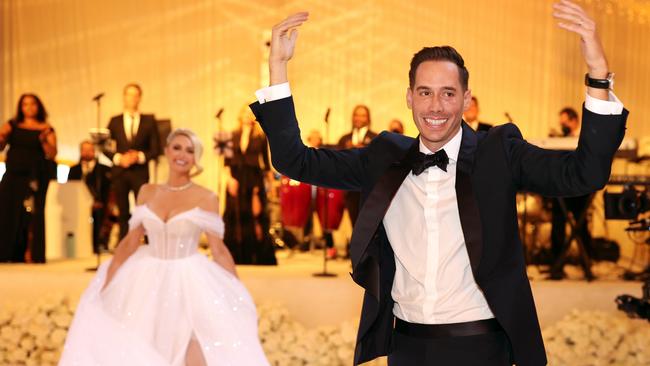 Her groom seemed thrilled to have finally said ‘I do’. Picture: Christopher Polk/Shutterstock/Media Mode