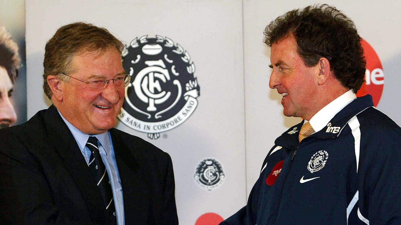 Carlton Football Club president businessman John Elliott shaking hands with coach Denis Pagan in 2002.