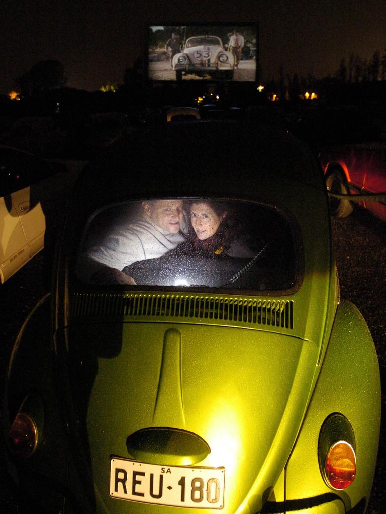 Volkswagen Beetle owners Rhonda and Peter Jarrett at the new film Herbie Fully Loaded at the Mainline drive-in at Gepps Cross in 2005.