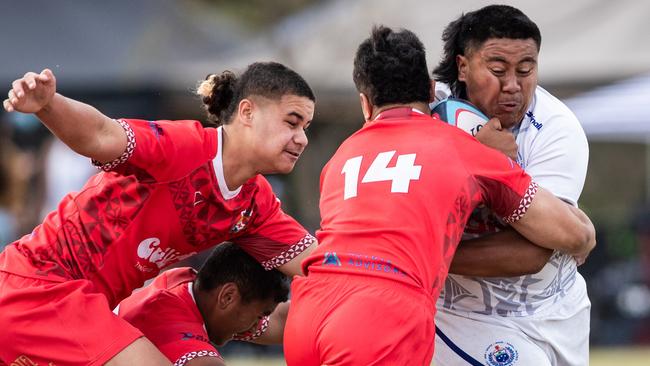 Hard-hitting players in the Tonga and Samoa match.