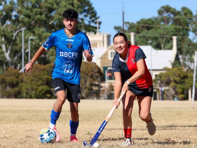 Georgio Flourentzou of AC Unito and Jemima Davies of Burnside Hockey Club at the eastern side of the UniSA Magill development site, where their clubs are pushing for multi-use pitches and shared clubrooms. Image/Russell Millard Photography