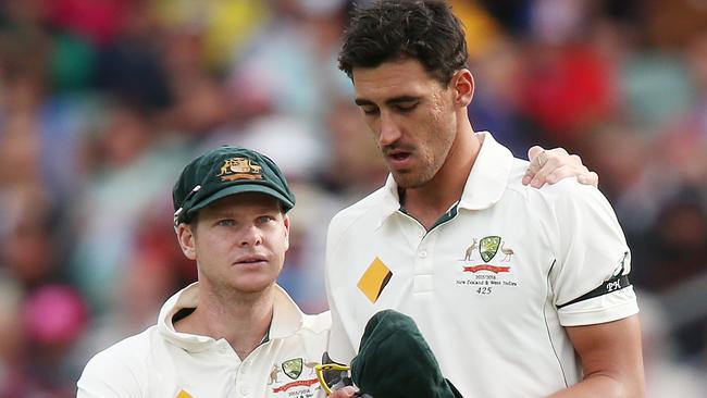 Mitchell Starc and Steve Smith. (Photo by Morne de Klerk/Getty Images)
